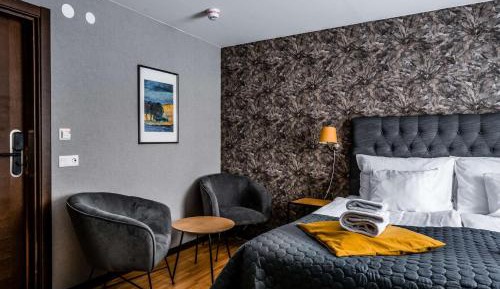 Standard Room with One King Bed and One Bunk Bed
