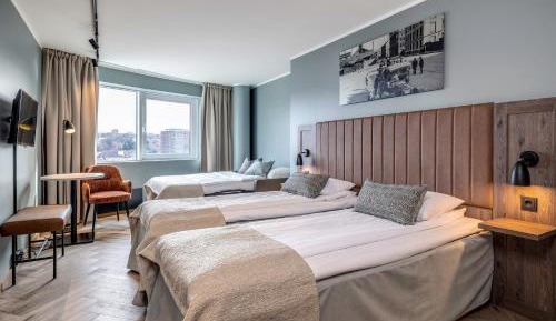Deluxe Twin room with Sofa Bed