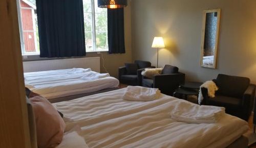Quadruple Room with Two Double Beds and shared Bathroom