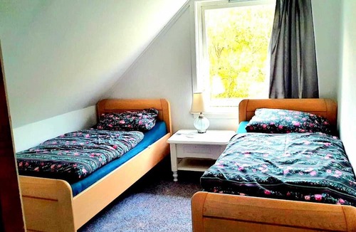 Sandoy Apartment | Vacation apartment with sea view for your guided fishing vacation.