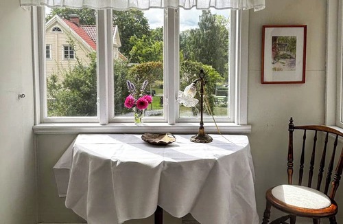 Asarum House | Farmhouse with tiled stoves near lake and forest
