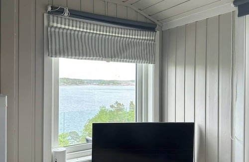 Sogne House | Cabin with views and a large terrace in Søgne