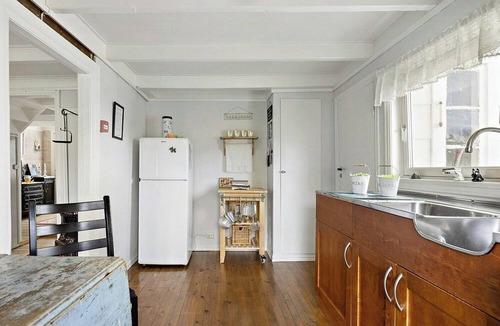 Sogndalstrand House | Traditional house with personal decor