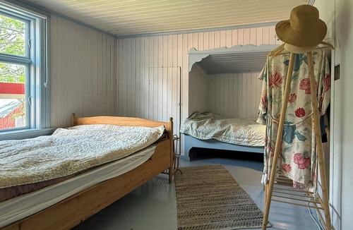 Drangedal House | 1770s farm with floating sauna by lake