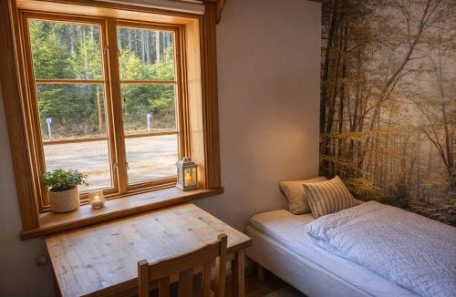 Skalsjo Bed & Breakfast | Skålsjögården Timber Lodge