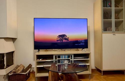 Ostavall Apartment | Bungalow med öppen spis Takdusch badkar och high speed wifi