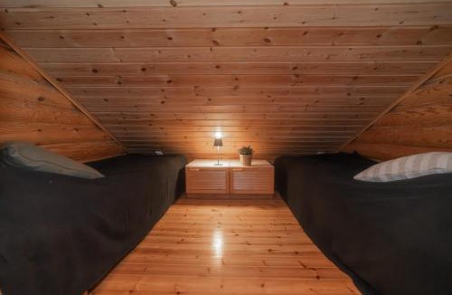 Rukatunturi Villa | Villa Porontima | Cozy Lakeside Cabin for 12