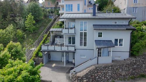 Tampere Apartment | Villa Rajaportti Loft House-Sleeps 14-Lake Views-Sauna Capital-Front Yard Parking-Electric Vehicle