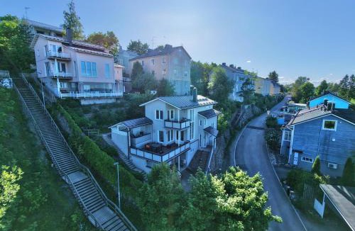 Tampere Apartment | Villa Rajaportti Loft House-Sleeps 14-Lake Views-Sauna Capital-Front Yard Parking-Electric Vehicle