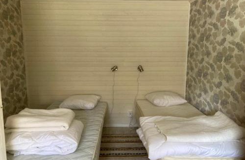 Oje House | Liten lägenhet i Öje med vandrarhemsstandard