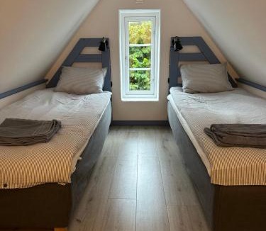 Abbekas House | Charmig stuga i Abbekås