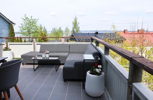 Tampere Apartment | Villa Rajaportti Loft House-Sleeps 14-Lake Views-Sauna Capital-Front Yard Parking-Electric Vehicle