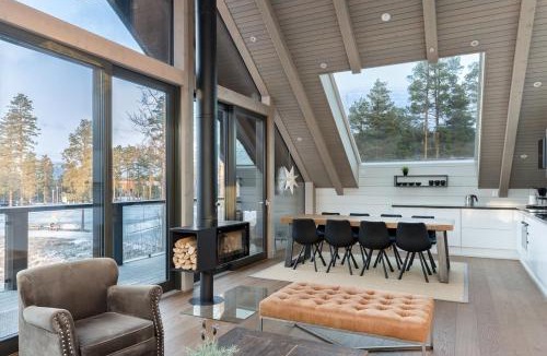 Ahtari House | Naava Chalet 401 Penthouse - Järvinäköala ilta-aurinkoon