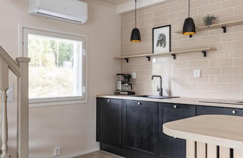Uurainen Apartment | Mökki ulkoporealtaalla
