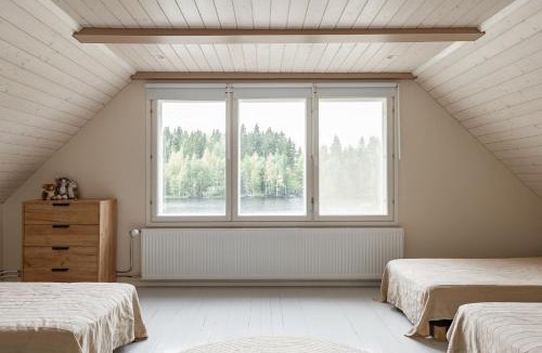 Uurainen Apartment | Mökki ulkoporealtaalla