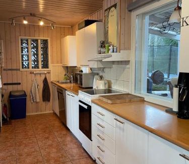 Vehmersalmi Villa | Villa Purnukka - Huvila upeissa järvimaisemissa ulkoporeammeella