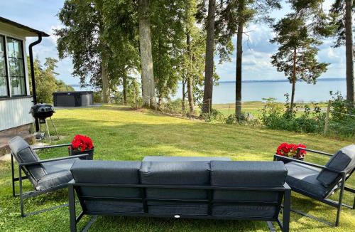 Vreta Kloster House | Manor wing with scenic lake view
