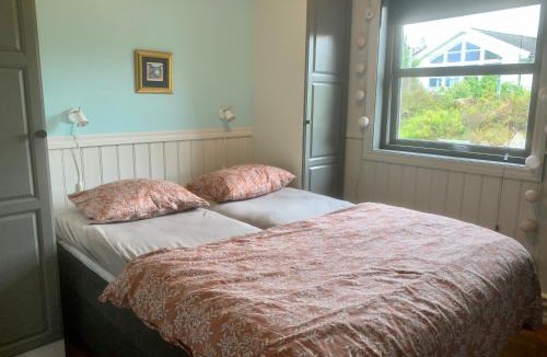 Sveio House | Exclusive fjordside villa with swimming pool, sauna, jacuzzi and boat hire