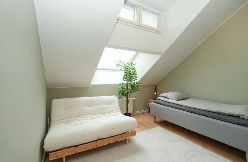 Kamppi Apartment | Bright & Modern Scandinavian Attic Suite in City Center