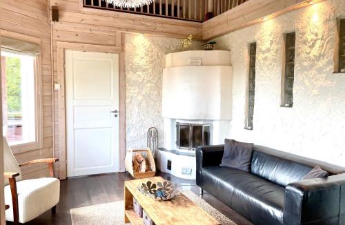 Rukatunturi House | Hietavilla Borealis - Hot tube - Sauna - AC - Fireplace - 11kW EV-refuel - Landscape view - Silence - Free WiFi
