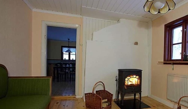 Holiday house by the forest, with fireplace stove