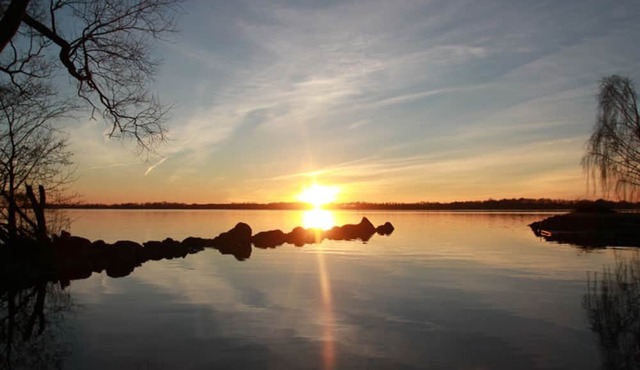 Beautiful holiday apartment right on the lake with boat, canoe, internet and jacuzzi in Bromölla