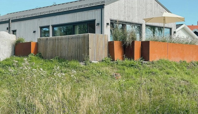 Sunlit coastal cottage with a grand terrace in Strömstad