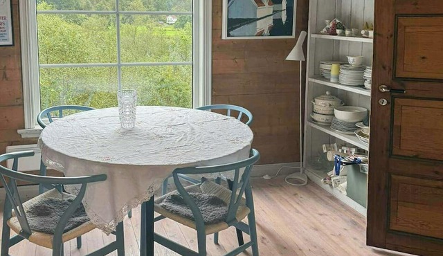 Traditional fjord cabin in Skjoldastraumen