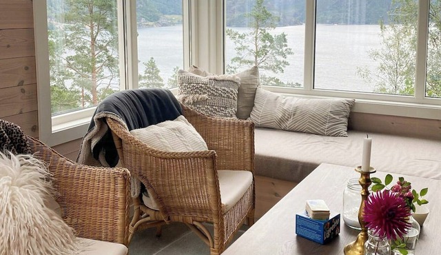Family cabin with view over fjord, mountain, wood