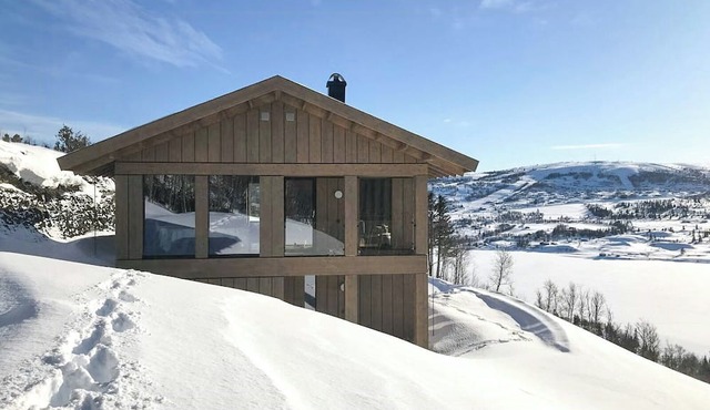 Family cabin with picturesque view at Røn