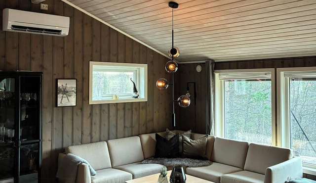 Renovated cabin with high ceiling and nature view