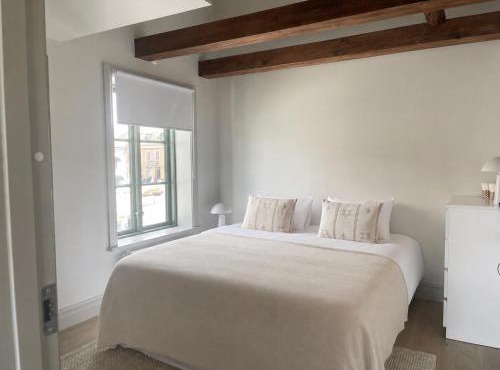 Modern APT with Exposed Wooden Beams in Visby
