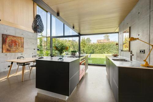 Modern industrial dream with sunny rooftop in Jar
