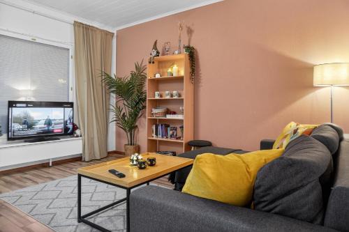 A one-bedroom apartment with a sauna near the center